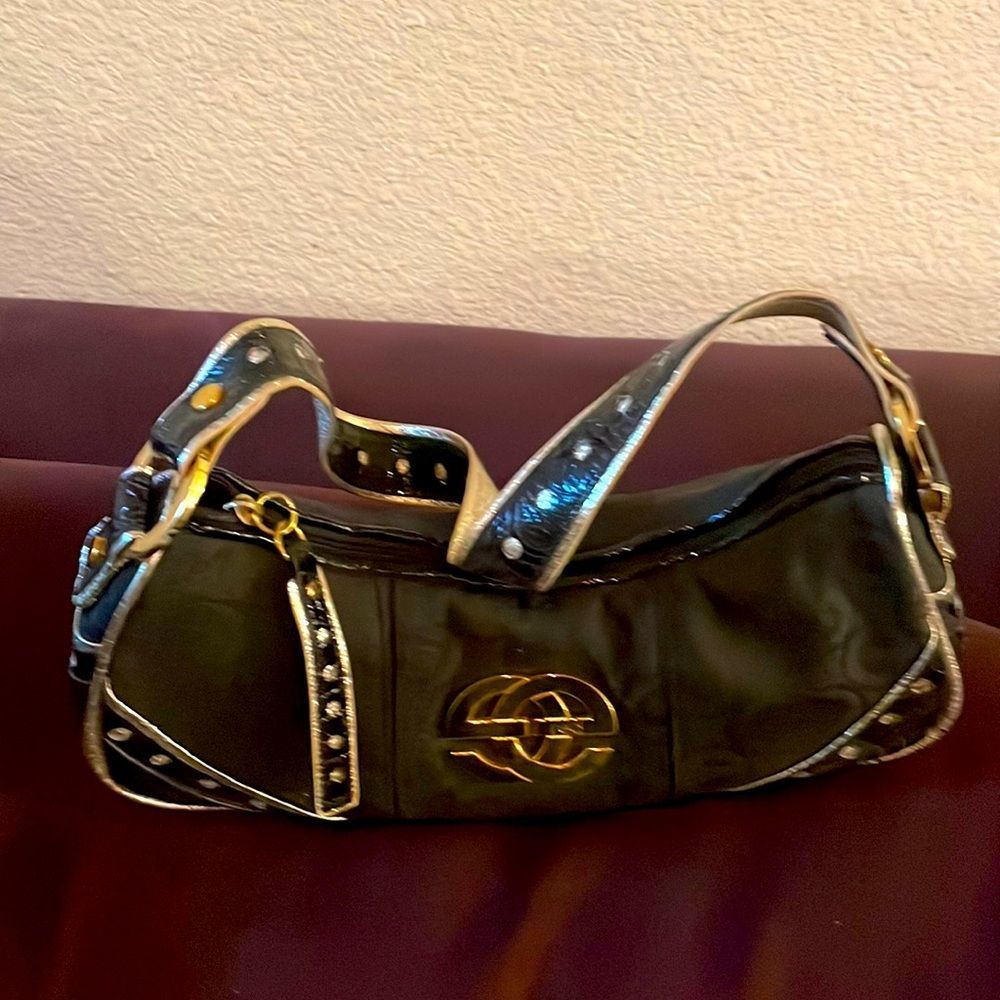 Handbag with gold trimming wipeable cloth bag/ inside red great condition